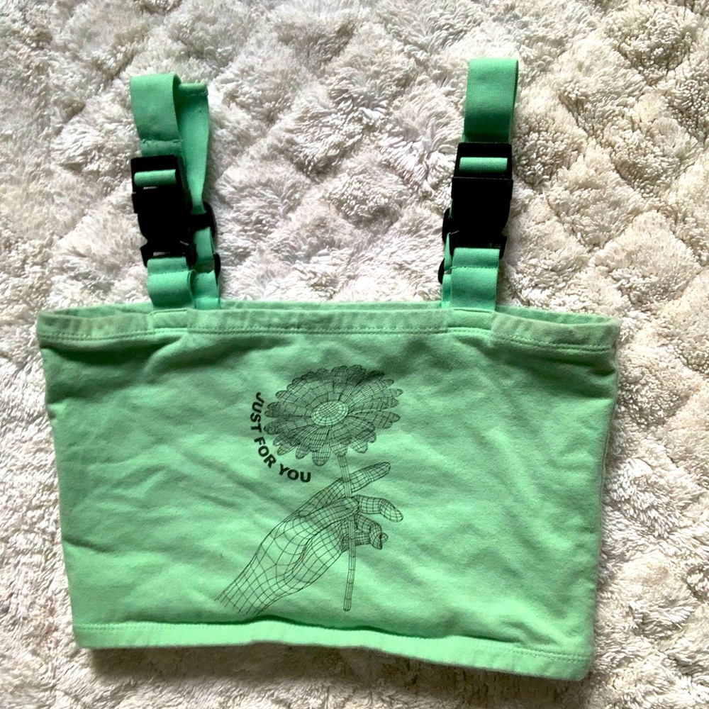 green graphic print tank top with buckles on straps: front and back